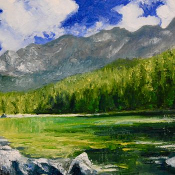 Eibsee is a clear water lake on the German - Austrian border, beneath the towering Zugspitze mountain.